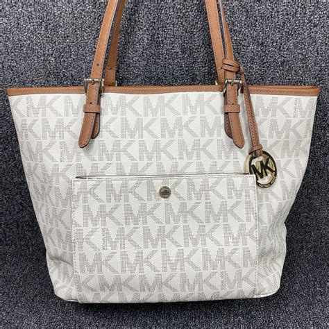 michael michael kors jet set item medium top zip snap pocket tote